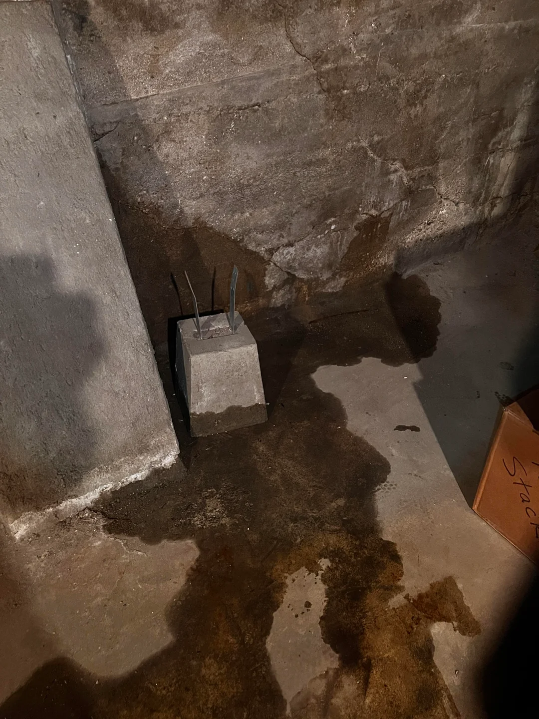Basement waterproofing Portland crew preparing a footing for foundation repair