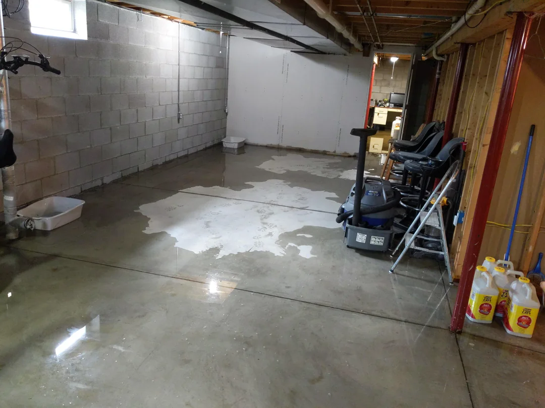 Basement waterproofing Portland interior drain tile and sump installed in an Alberta daylight basement