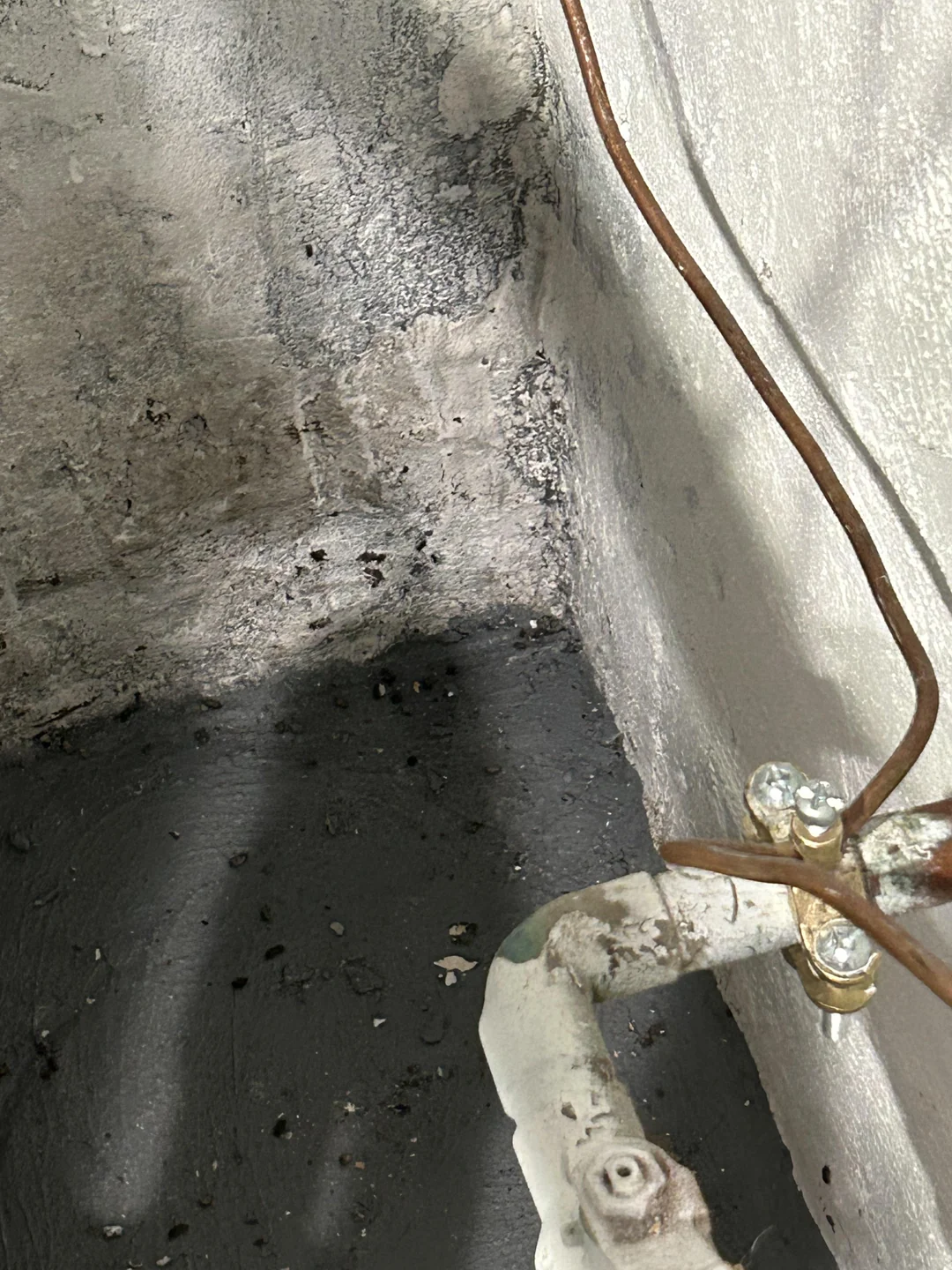 Downspout drainage checked as part of a Portland rainy season basement waterproofing checklist